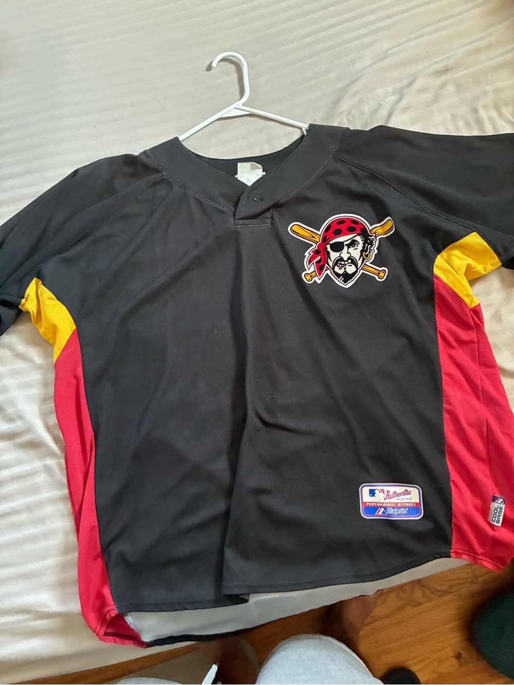 Majestic Pittsburgh Pirates Black Jersey with red and yellow trim.
